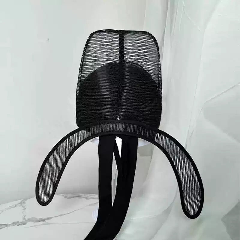 Rear view of the scholar hat with removable wings and ribbons