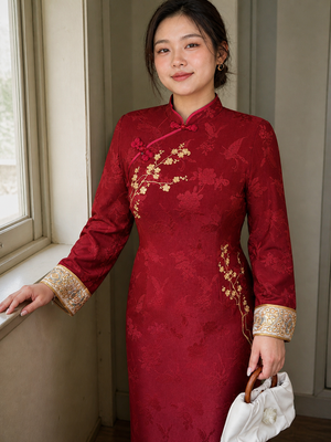 Red Gold qipao collar, embroidery and cuff detail in natural daylight