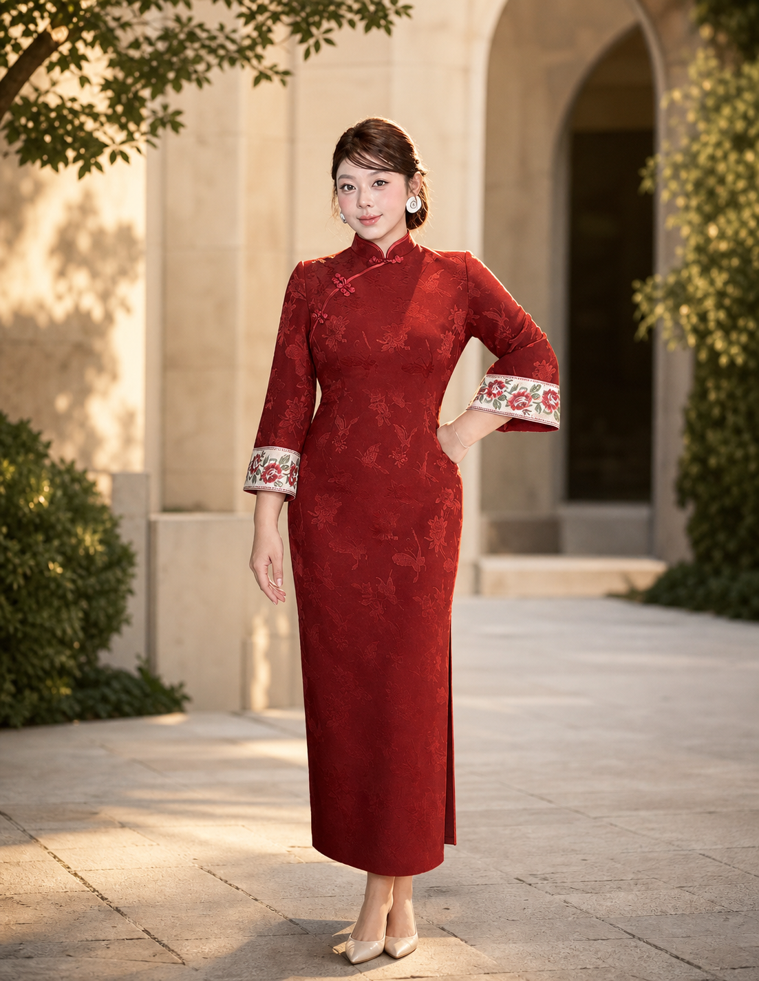 Red Wall Butterfly plus size engagement qipao in golden outdoor light, full front view