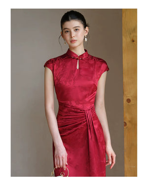 Ruby Red acetate jacquard pleated qipao dress shown as a polished modern red qipao dress, highlighting acetate jacquard, sculpted pleats and elegant Chinese dress silhouette.