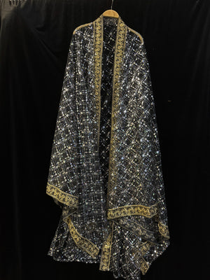 Black sheer sequin Hanfu robe with ornate gold-tone borders against a black backdrop