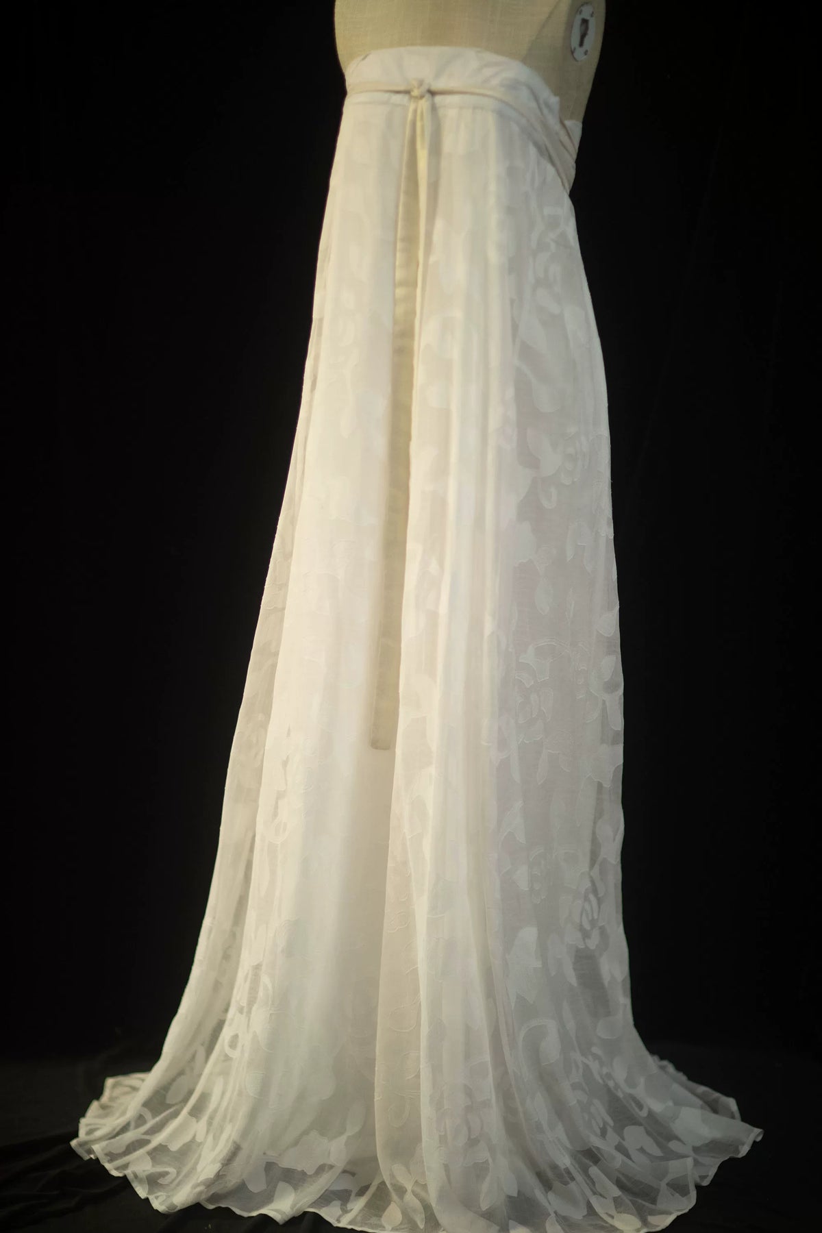 White Hanfu skirt displayed alone with a same-fabric waistband and a flowing floor-length hem