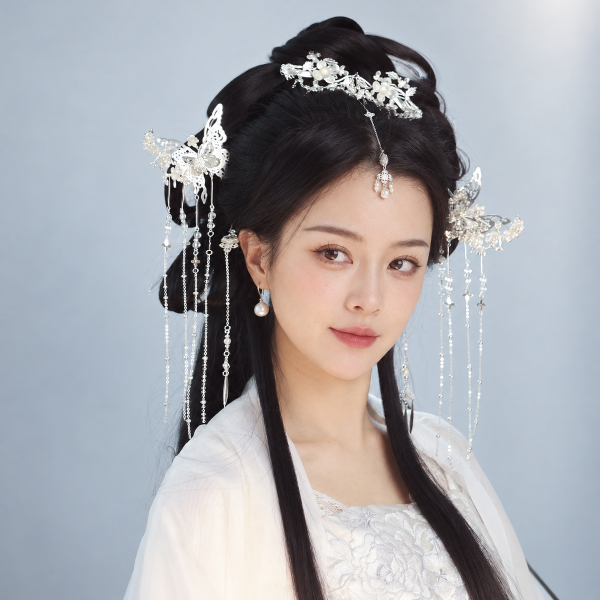 Silver-tone floral and butterfly hair accessories with beaded tassels, model styling view 08