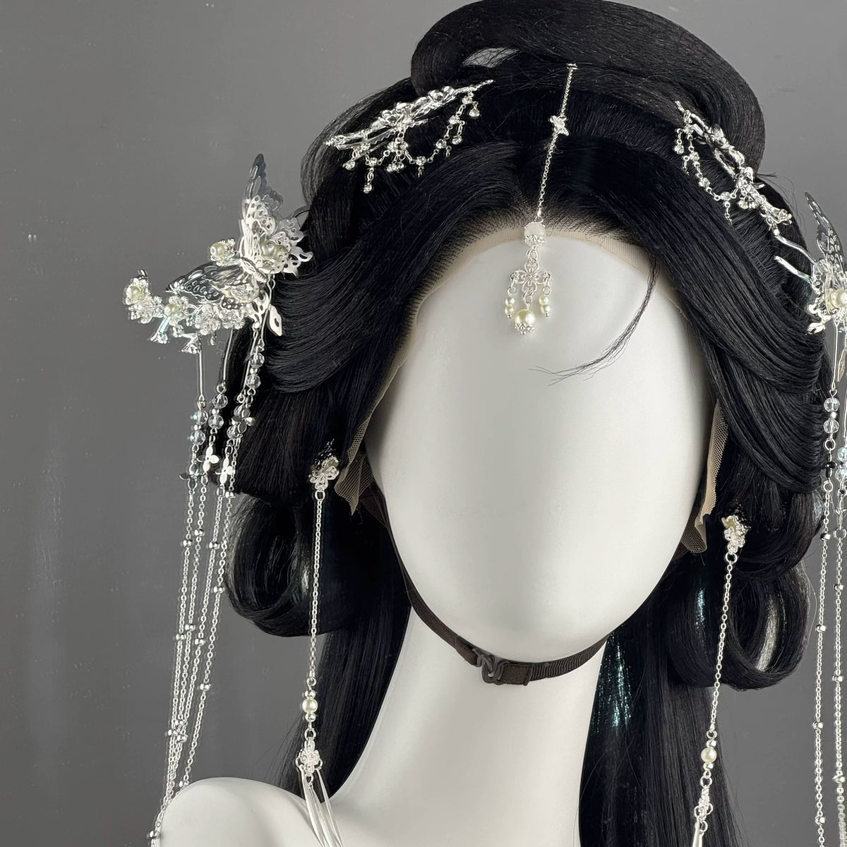 Huajian silver-tone floral hair accessory set on a black wig