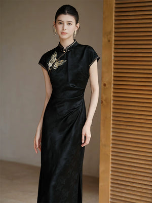 Smoke-Ink black acetate embroidered long qipao dress shown as a polished black qipao dress, highlighting acetate sheen, refined embroidery and long modern cheongsam silhouette.
