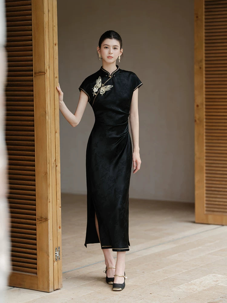 Three-quarter product view of the Smoke-Ink black acetate embroidered long qipao dress, a refined black qipao dress for elegant occasions.