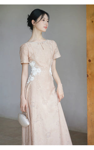 Detailed product image of the Soft Sand Pink floral applique cheongsam dress, showing fabric texture, finish and craftsmanship.