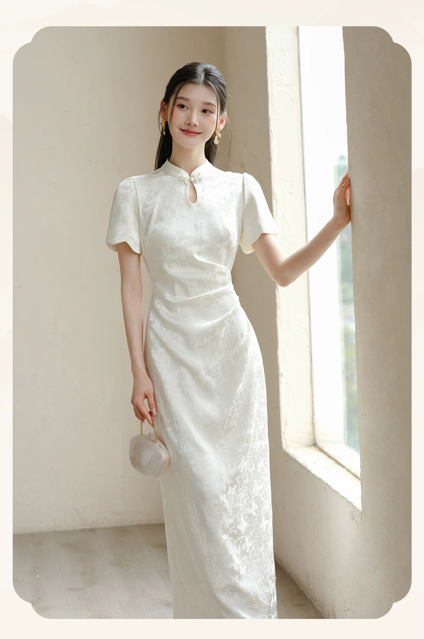 Detailed product image of the Soft White jacquard pleated qipao dress, showing fabric texture, finish and craftsmanship.