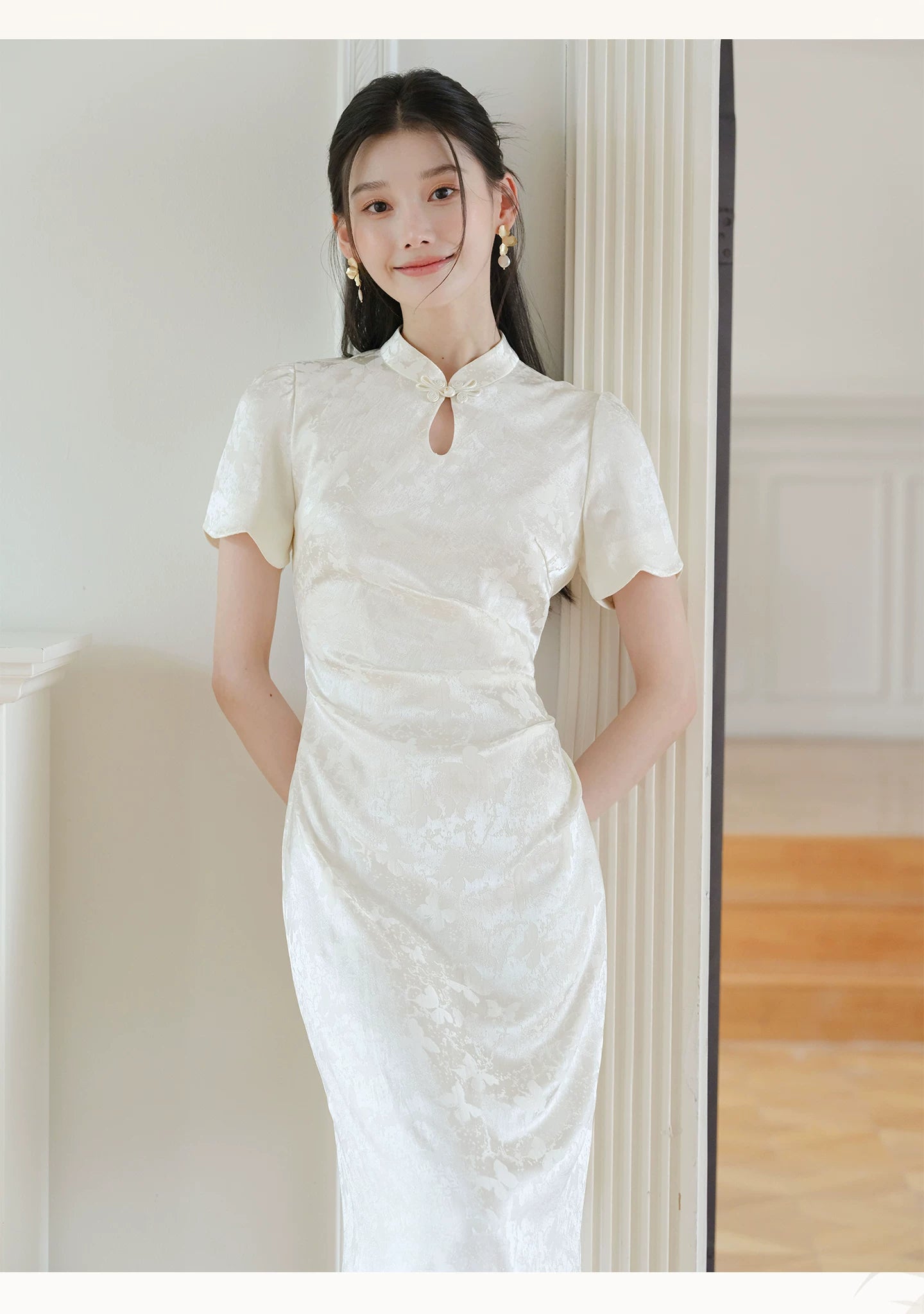 Silhouette and fit view of the Soft White jacquard pleated qipao dress, a contemporary modern white qipao dress.