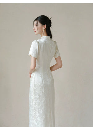 Silhouette and fit view of the Soft White jacquard pleated qipao dress, a contemporary modern white qipao dress.
