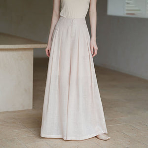 Detailed product image of the Tea Beige ramie long top and wide-leg pants set, showing fabric texture, finish and craftsmanship.