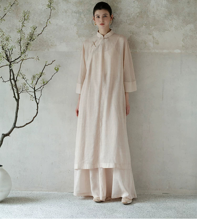 Tea Beige ramie long top and wide-leg pants set styled to show its fit and drape, including breathable ramie layers, relaxed long top and fluid wide-leg trousers.
