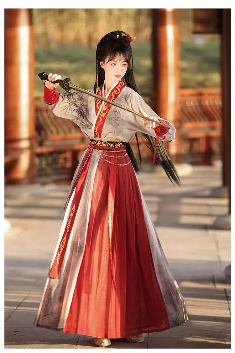 Red modern hanfu dress for women, blending traditional Song Dynasty elegance with contemporary style. Crafted from luxurious silk, this hanfu includes an optional matching coat or jacket, making it suitable for winter, casual outings, or formal occasions like graduations. Available at our online hanfu shop, offering a range of authentic hanfu for sale, this piece combines the beauty of classic Chinese clothing with modern fashion elements from top Chinese brands. Perfect for anyone looking for where to buy 