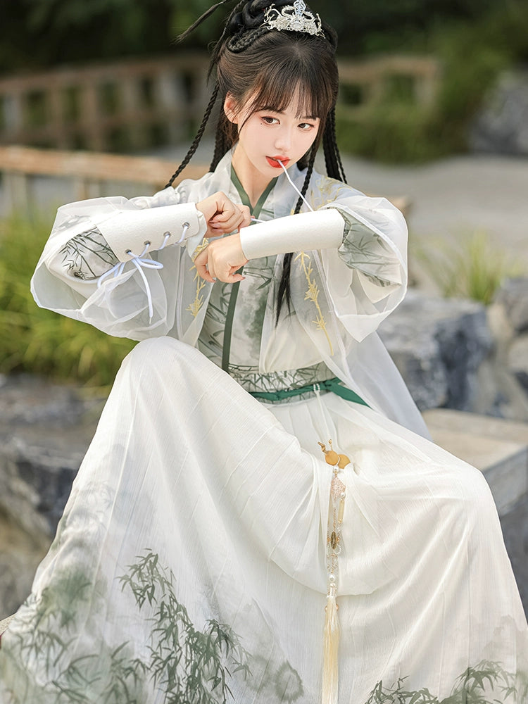 A traditional Chinese hanfu in a beautiful combination of pink and green, designed for women. This elegant dress is perfect for celebrating Chinese festivals like the Lunar New Year, as well as for cultural performances or cosplay events, showcasing classic Chinese fashion with a modern twist.