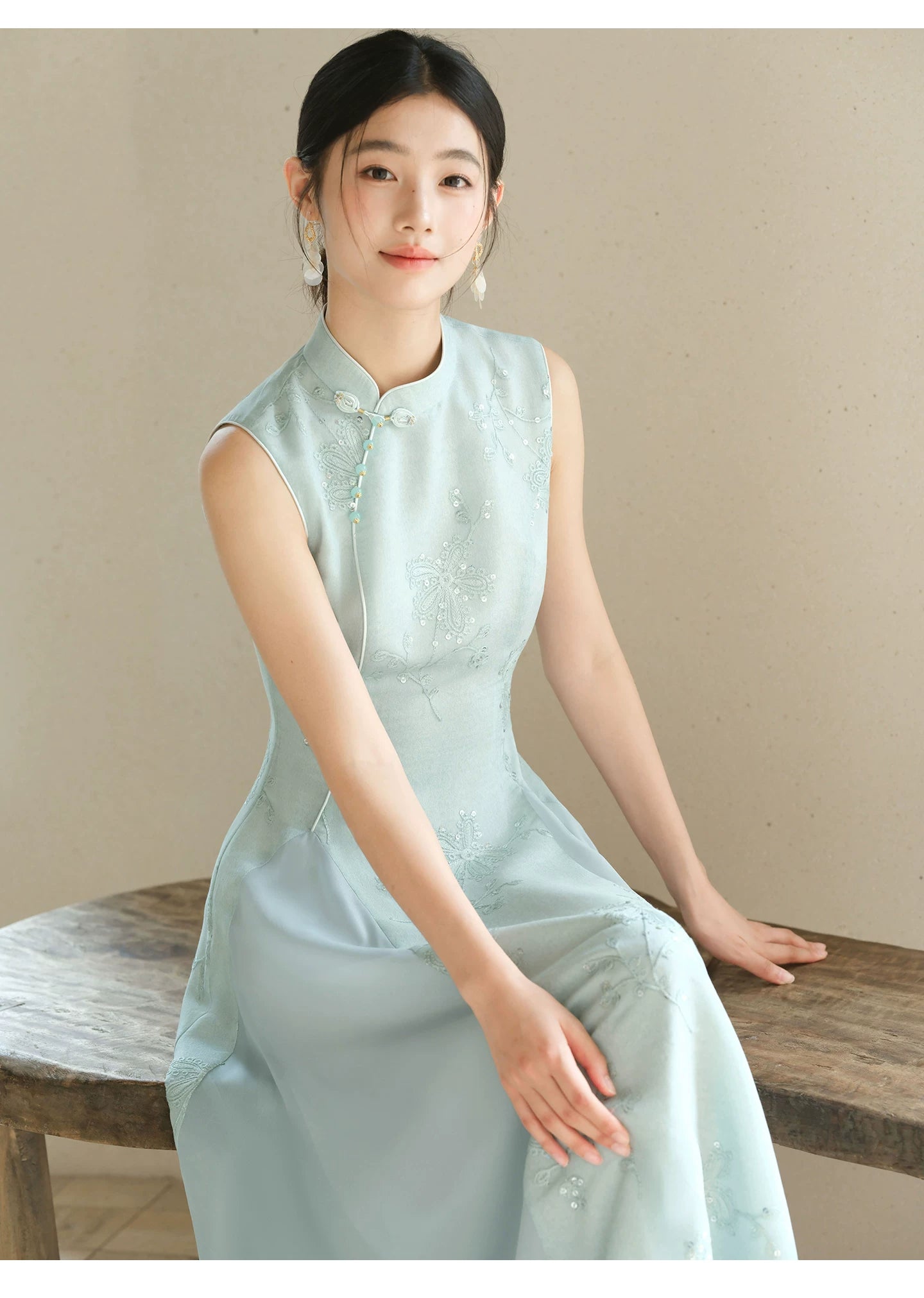 Silhouette and fit view of the Water-Blue jacquard A-line qipao dress, a contemporary modern blue qipao dress.