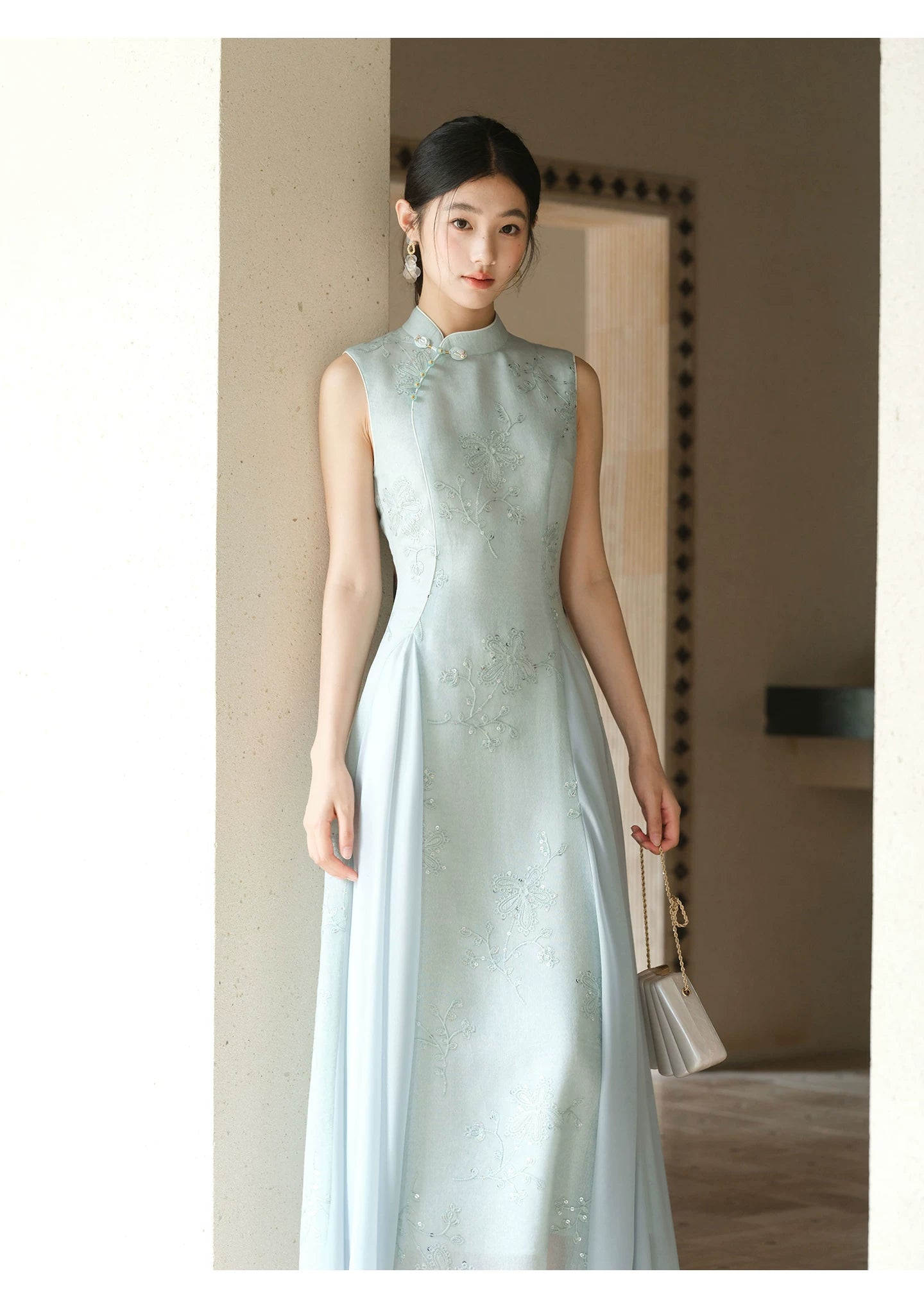 Design view of the Water-Blue jacquard A-line qipao dress, highlighting jacquard texture, Chinese collar and graceful A-line cheongsam silhouette.