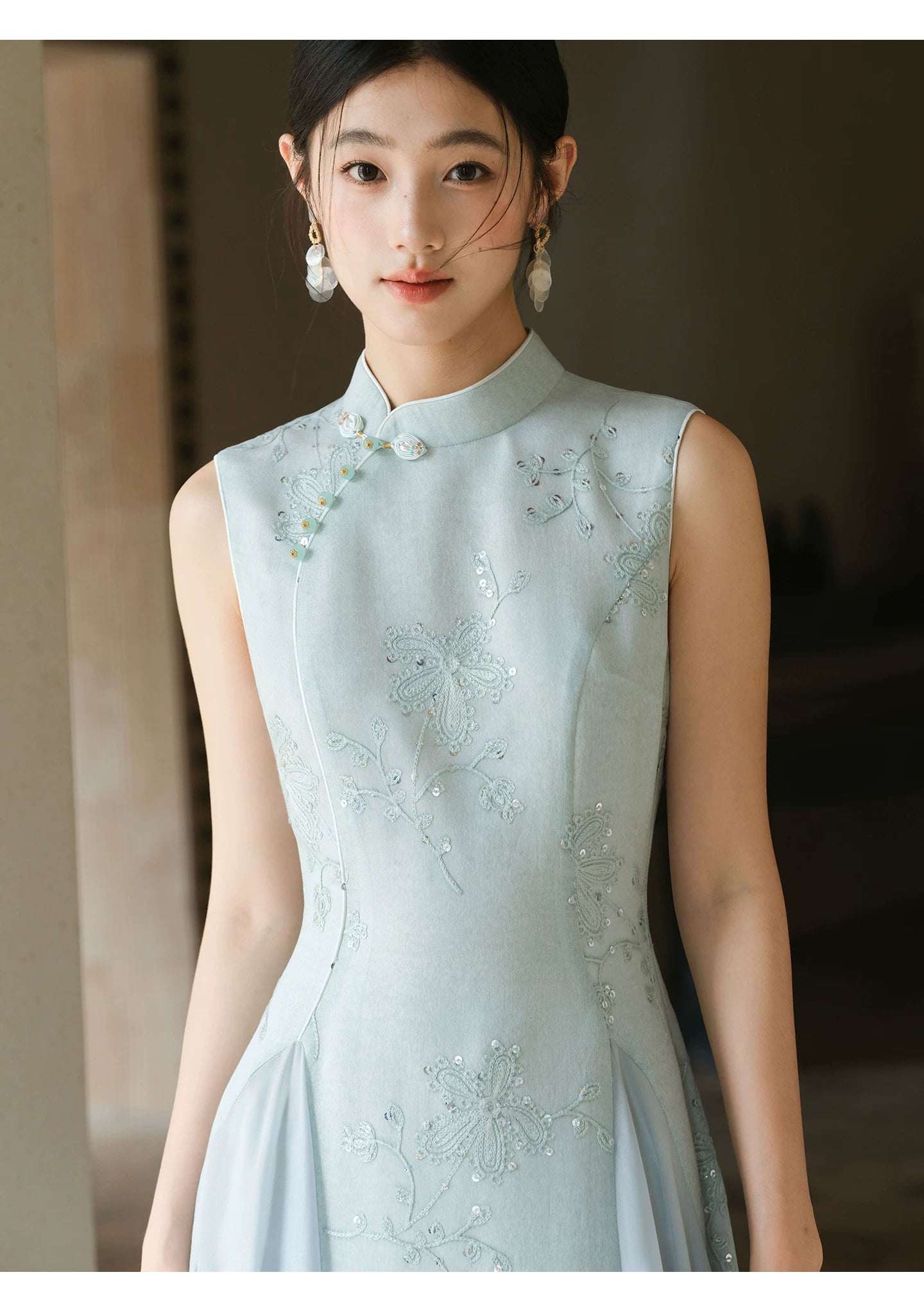 Close product view of the Water-Blue jacquard A-line qipao dress, focused on its Chinese-inspired design details.