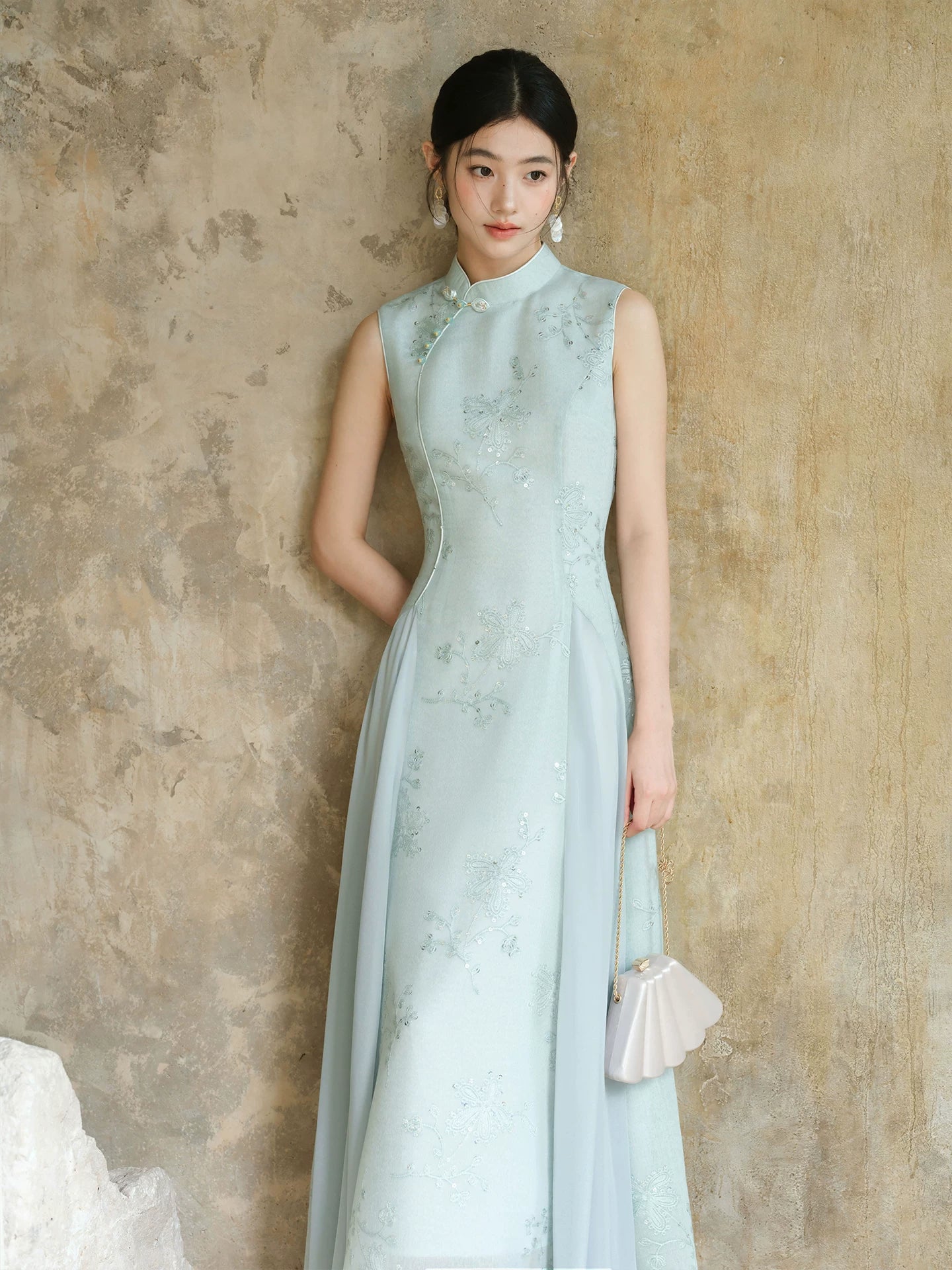 Water-Blue jacquard A-line qipao dress shown as a polished modern blue qipao dress, highlighting jacquard texture, Chinese collar and graceful A-line cheongsam silhouette.