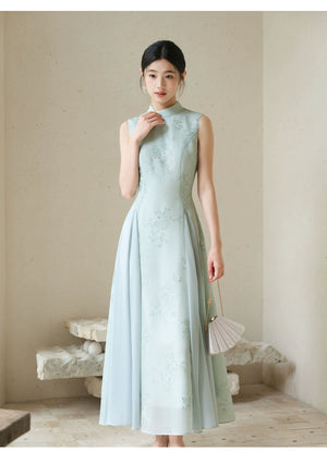 Water-Blue jacquard A-line qipao dress styled to show its fit and drape, including jacquard texture, Chinese collar and graceful A-line cheongsam silhouette.