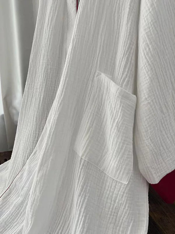 Full-length white cotton gauze robe showing the 120 or 135 cm flowing silhouette