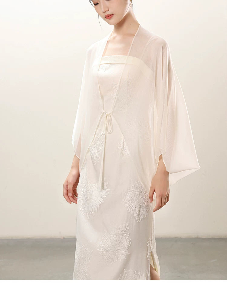 Silhouette and fit view of the White embroidered slip dress and sheer outer layer, a contemporary white New Chinese Style outfit.
