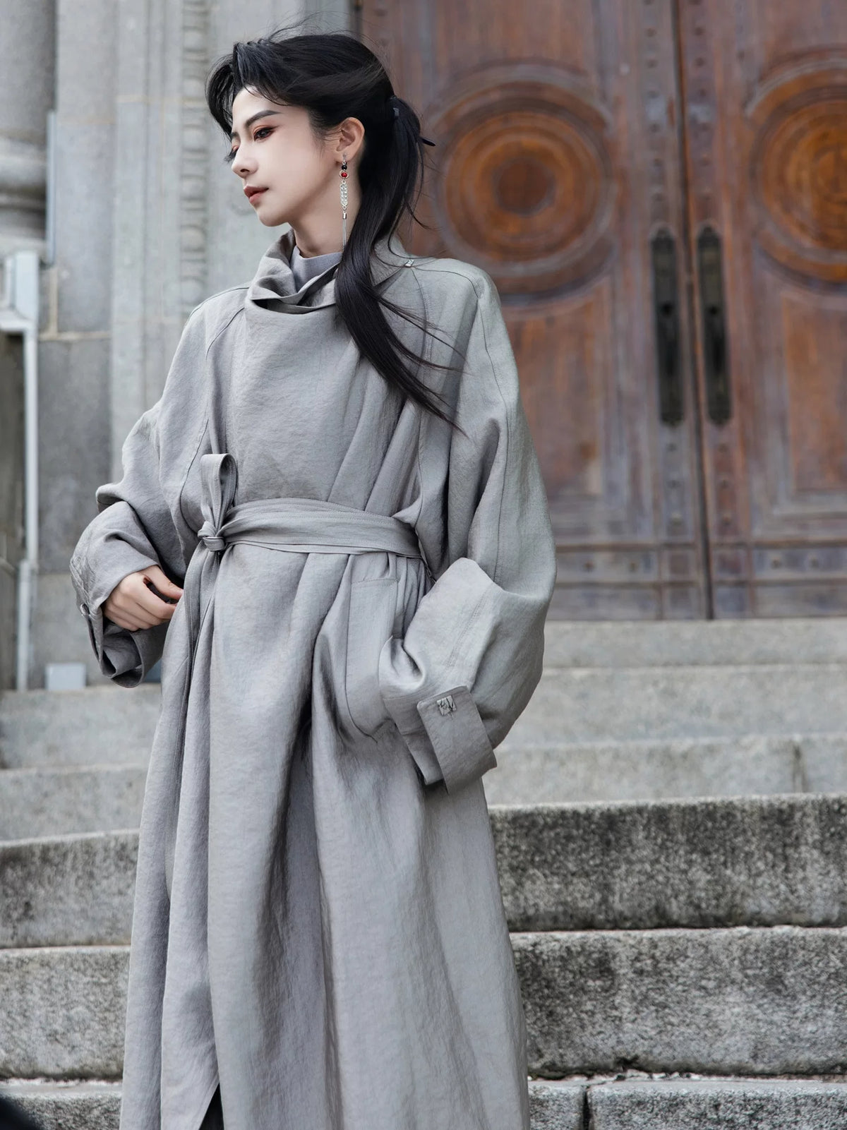 Gray coat showing draped collar