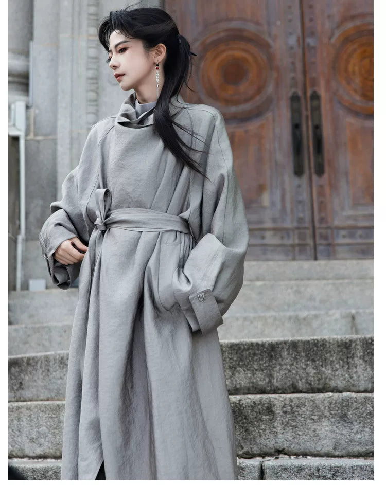 Gray coat showing sleeve and belt