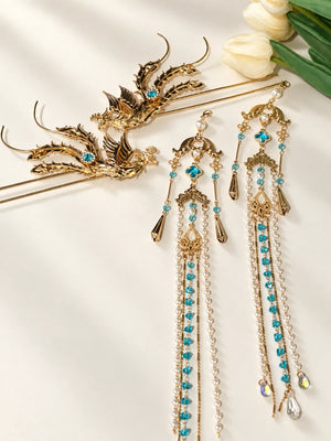 Blue-accent phoenix feather hairpins displayed together