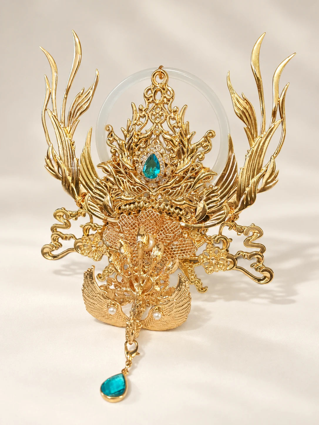 Xianyu gold-tone phoenix crown displayed alone