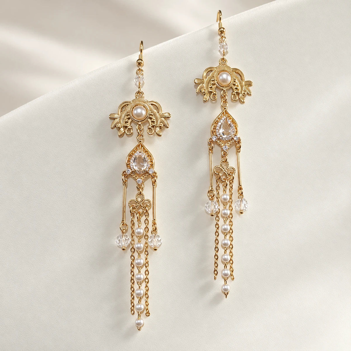 Long matching earrings with clear accents