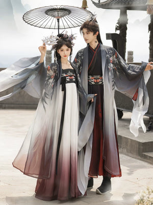 Xuanniao matching gradient Hanfu outfits styled together beneath a white parasol