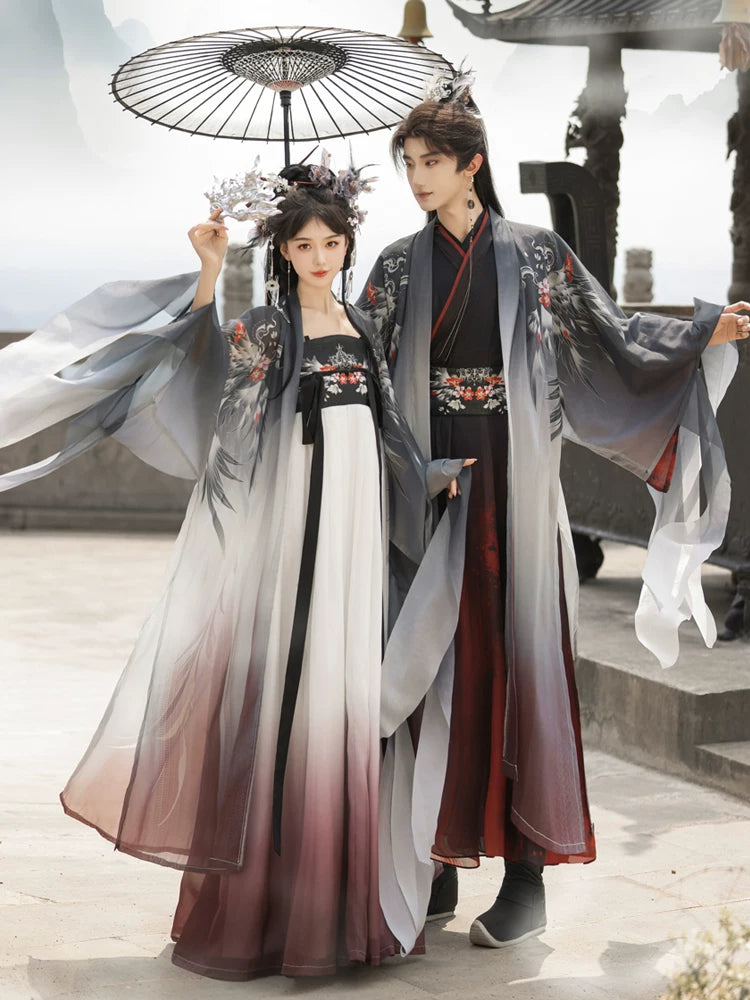 Xuanniao matching gradient Hanfu outfits styled together beneath a white parasol