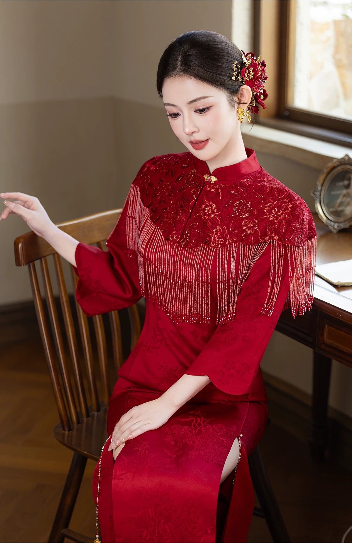 Yun Ying Red Bridal Cheongsam & Beaded Fringe Capelet — Seated view showing fringe capelet and dress