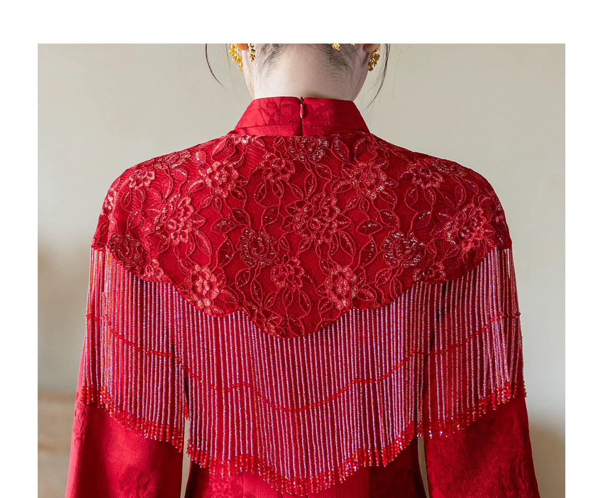 Back of the red lace and fringe capelet