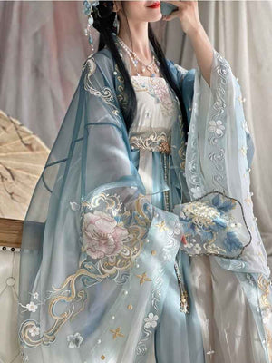 Featuring a diverse collection of Hanfu styles, this display presents a blend of traditional and modern elements, from the intricate embroidery of classic Hanfu to contemporary menswear. The assortment includes authentic Tang Dynasty dresses and detailed Ming Dynasty Hanfu, alongside luxurious royal attire and scholar officials' outfits. With a special emphasis on men's Hanfu, the exhibit highlights the rich cultural tapestry of traditional Asian clothing and modern, Asian-inspired fashion