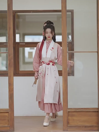 Pink modern Hanfu dress featuring a stylish and elegant design with intricate embroidery and traditional Chinese accents. Perfect for special events or cultural celebrations. Exudes sophistication and femininity in a contemporary take on traditional Hanfu attire.