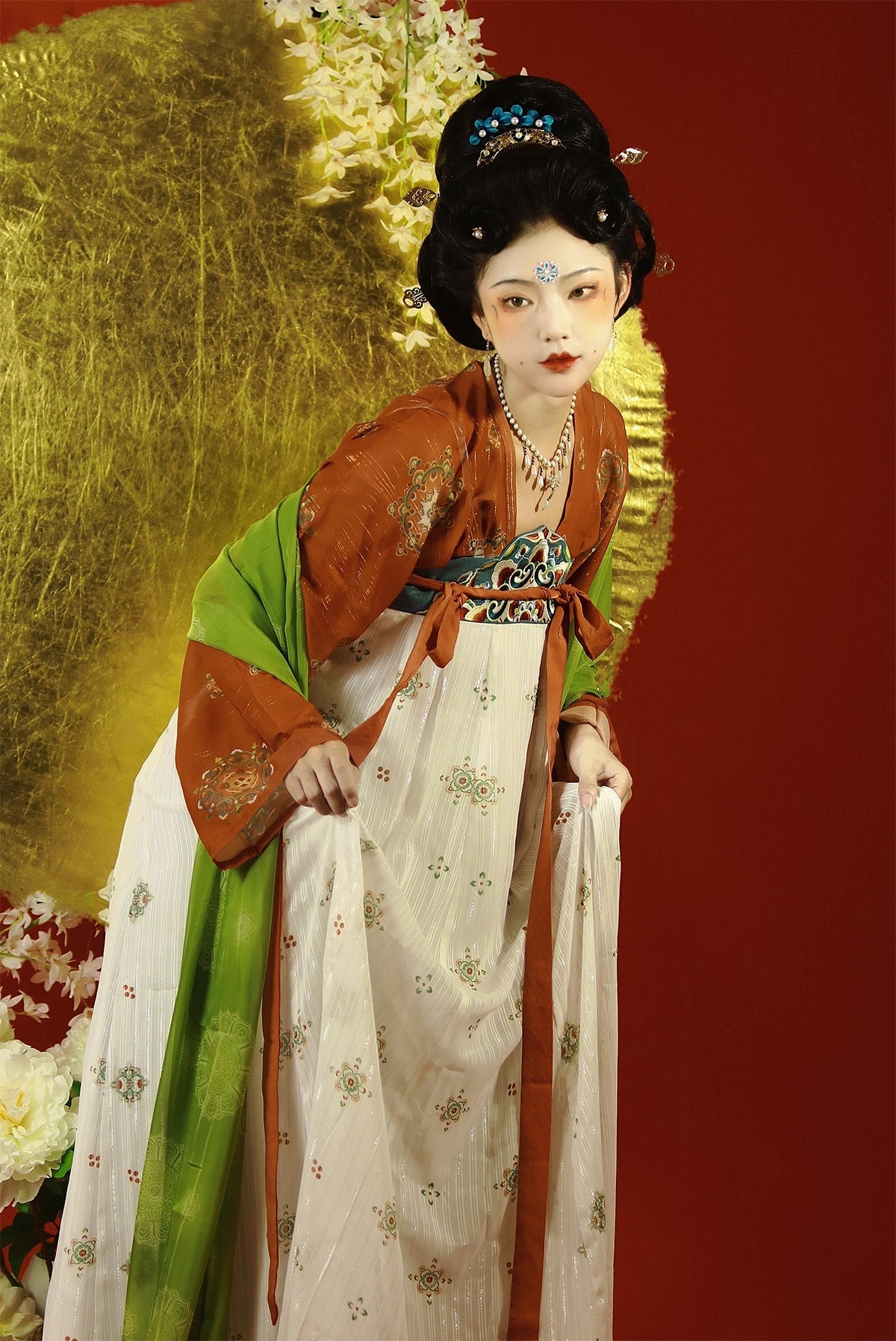 Featuring a diverse collection of Hanfu styles, this display presents a blend of traditional and modern elements, from the intricate embroidery of classic Hanfu to contemporary menswear. The assortment includes authentic Tang Dynasty dresses and detailed Ming Dynasty Hanfu, alongside luxurious royal attire and scholar officials' outfits. With a special emphasis on men's Hanfu, the exhibit highlights the rich cultural tapestry of traditional Asian clothing and modern, Asian-inspired fashion