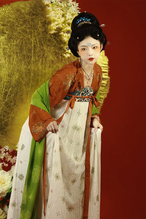 Featuring a diverse collection of Hanfu styles, this display presents a blend of traditional and modern elements, from the intricate embroidery of classic Hanfu to contemporary menswear. The assortment includes authentic Tang Dynasty dresses and detailed Ming Dynasty Hanfu, alongside luxurious royal attire and scholar officials' outfits. With a special emphasis on men's Hanfu, the exhibit highlights the rich cultural tapestry of traditional Asian clothing and modern, Asian-inspired fashion