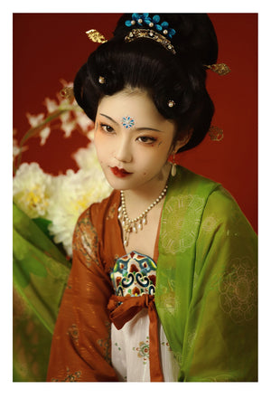 Featuring a diverse collection of Hanfu styles, this display presents a blend of traditional and modern elements, from the intricate embroidery of classic Hanfu to contemporary menswear. The assortment includes authentic Tang Dynasty dresses and detailed Ming Dynasty Hanfu, alongside luxurious royal attire and scholar officials' outfits. With a special emphasis on men's Hanfu, the exhibit highlights the rich cultural tapestry of traditional Asian clothing and modern, Asian-inspired fashion