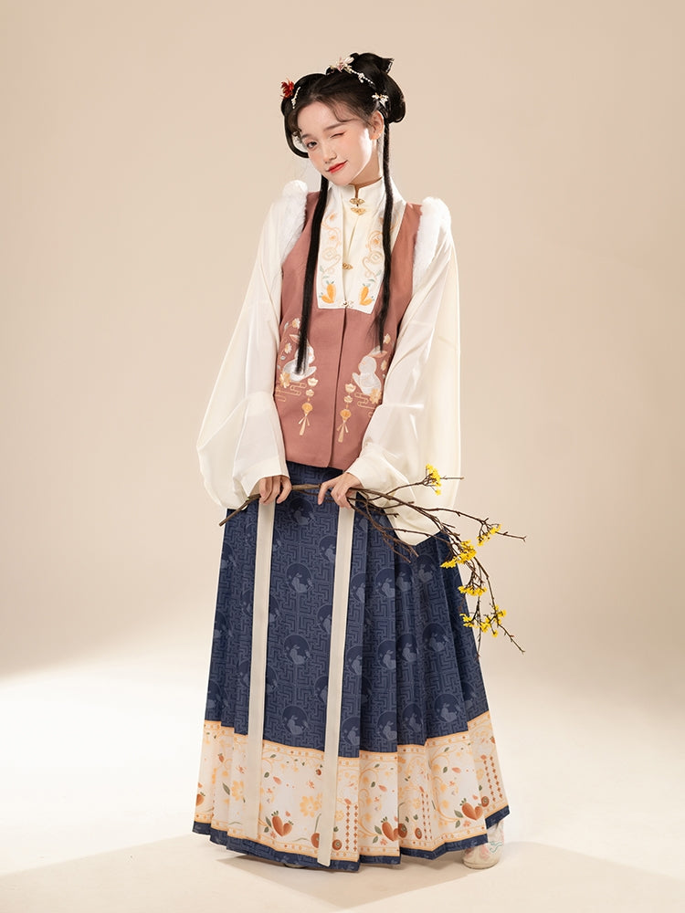 Ming Dynasty | An imperial Chinese scholar official robed in elaborately decorated royal Ming dynasty Hanfu with rich embroidered patterns and angular motifs, wearing a traditional mandarin hat topped with a large red tassel, representing traditional East Asian court clothing during the height of imperial China