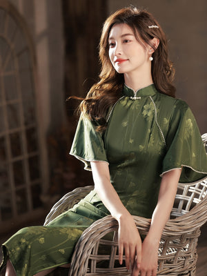 Featuring an elegant display of an array of items including a Green Qipao dress, a modern Qipao shirt and a sexy Cheongsam, this collection presents a blend of traditional and modern styles. The modern Cheongsam dress, along with the Cheongsam modern top, redefines traditional aesthetics with a contemporary twist. Adding an element of allure is the sexy Cheongsam lingerie, complemented by a green Cheongsam shirt in comfortable fabric.