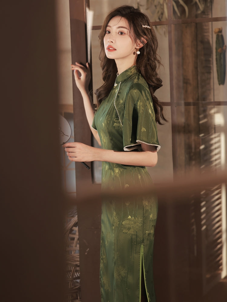 Featuring an elegant display of an array of items including a Green Qipao dress, a modern Qipao shirt and a sexy Cheongsam, this collection presents a blend of traditional and modern styles. The modern Cheongsam dress, along with the Cheongsam modern top, redefines traditional aesthetics with a contemporary twist. Adding an element of allure is the sexy Cheongsam lingerie, complemented by a green Cheongsam shirt in comfortable fabric.