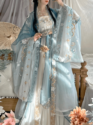 Featuring a diverse collection of Hanfu styles, this display presents a blend of traditional and modern elements, from the intricate embroidery of classic Hanfu to contemporary menswear. The assortment includes authentic Tang Dynasty dresses and detailed Ming Dynasty Hanfu, alongside luxurious royal attire and scholar officials' outfits. With a special emphasis on men's Hanfu, the exhibit highlights the rich cultural tapestry of traditional Asian clothing and modern, Asian-inspired fashion