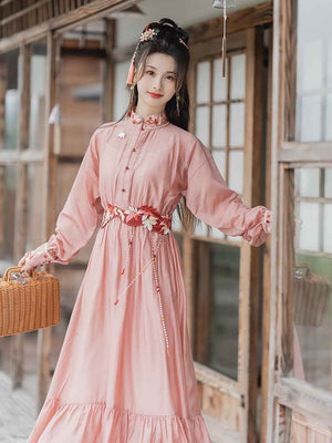 Pink modern Hanfu dress featuring a stylish and elegant design with intricate embroidery and traditional Chinese accents. Perfect for special events or cultural celebrations. Exudes sophistication and femininity in a contemporary take on traditional Hanfu attire.