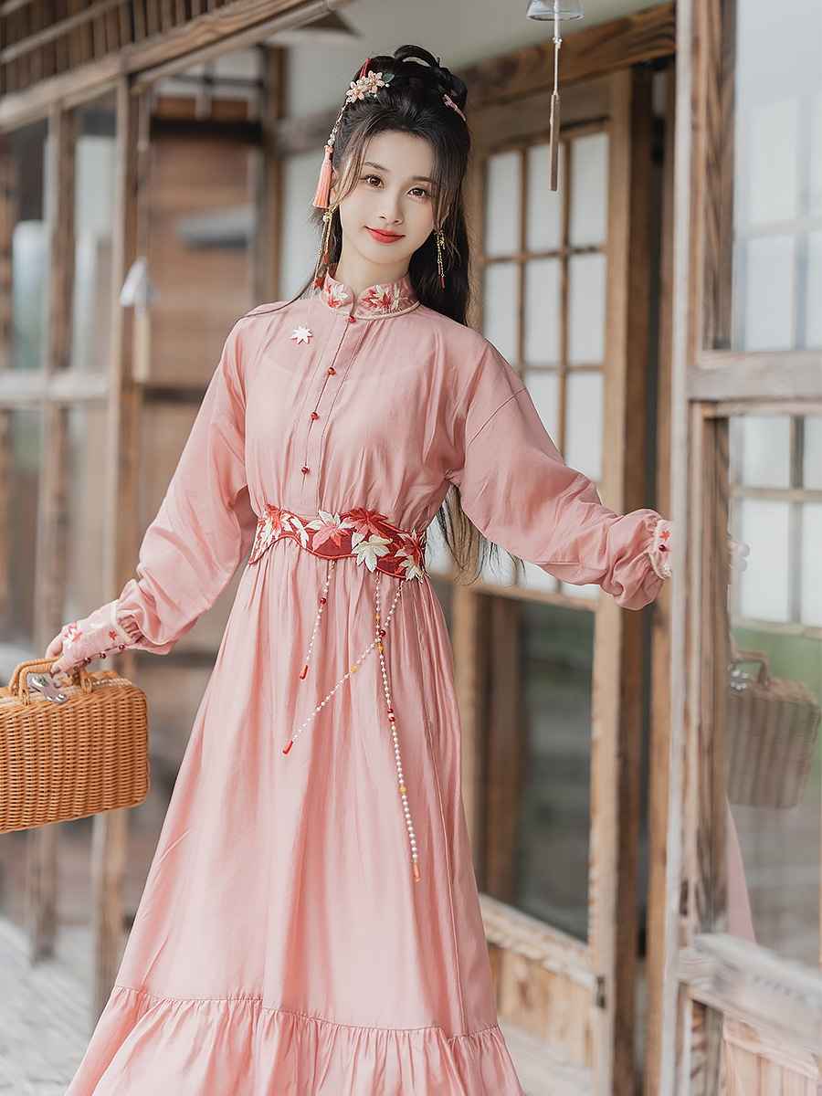 Pink modern Hanfu dress featuring a stylish and elegant design with intricate embroidery and traditional Chinese accents. Perfect for special events or cultural celebrations. Exudes sophistication and femininity in a contemporary take on traditional Hanfu attire.