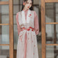 Pink modern Hanfu dress featuring a stylish and elegant design with intricate embroidery and traditional Chinese accents. Perfect for special events or cultural celebrations. Exudes sophistication and femininity in a contemporary take on traditional Hanfu attire.