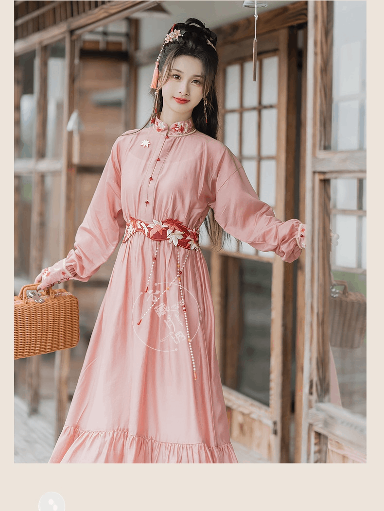 Pink modern Hanfu dress featuring a stylish and elegant design with intricate embroidery and traditional Chinese accents. Perfect for special events or cultural celebrations. Exudes sophistication and femininity in a contemporary take on traditional Hanfu attire.