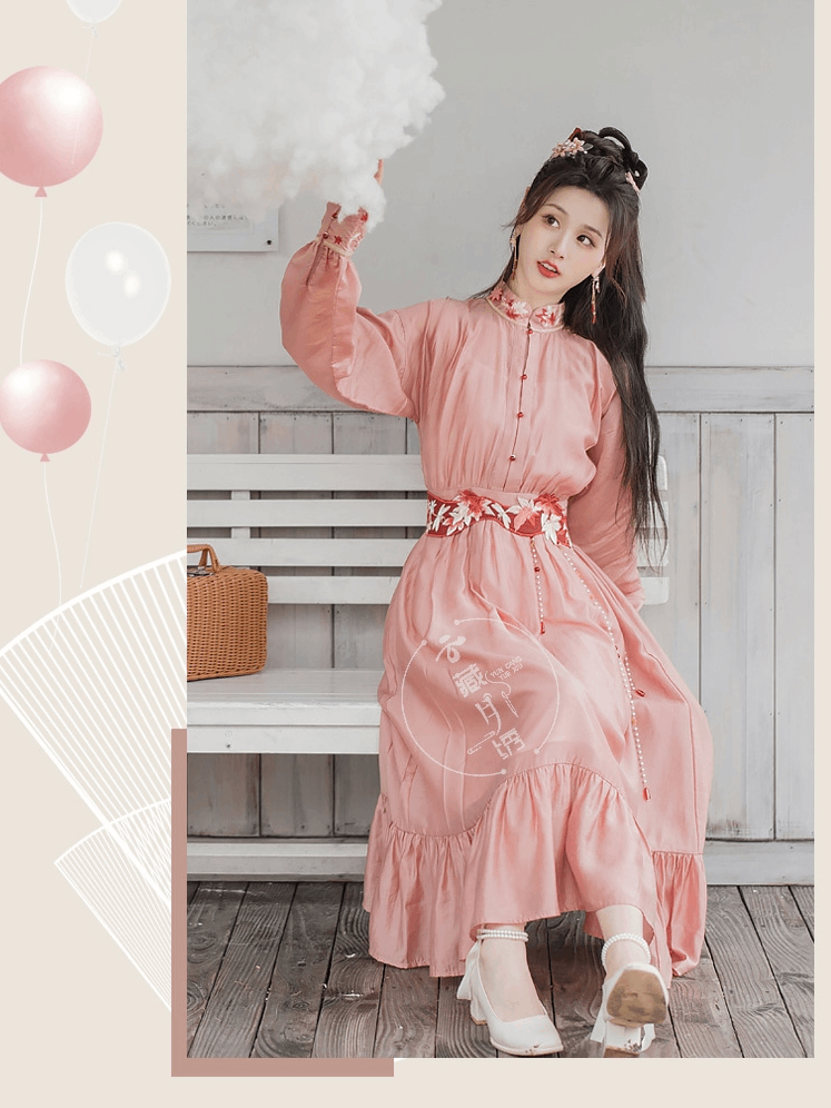 Pink modern Hanfu dress featuring a stylish and elegant design with intricate embroidery and traditional Chinese accents. Perfect for special events or cultural celebrations. Exudes sophistication and femininity in a contemporary take on traditional Hanfu attire.